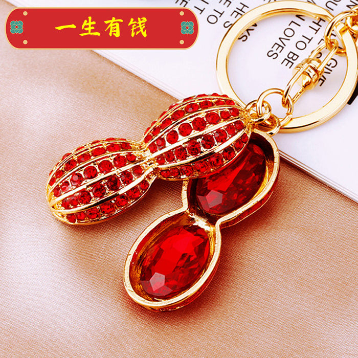 Jeweled Money Peanut Keychains in Red and Yellow with Plain and Fortune Loops