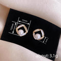Pearl Geometric Stud Earrings in Gold Tone Polished Metal Jewelry view 4