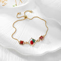 Gold Tone Pressed Flower Crystal Heart Slider Bracelets in Nine Designs view 11