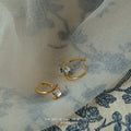 Gold Mini Huggie Hoop Side Set Clear Crystal Earrings view 1