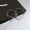 Open Bow Wire Hoop Earrings in Gold and Silver Tone view 7