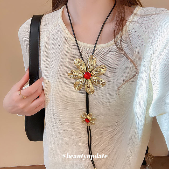 Gold Tone Flower Pendant Long Black Cord Necklace Jewelry