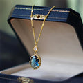 Teal Oval Halo Pendant Necklace With Round Clear Accent view 1