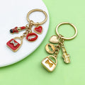 Fashion Accessory Charm Keychains Featuring Red Lipstick Across 43 Pictured Variations view 3