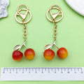 Strawberry and Cherry Charm Keychains Featuring Yellow Cherry Across 47 Variations view 3