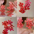 Red Fabric Flower Cascade Earrings In Clip And Stud Styles view 1