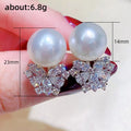 Silver Tone Pearl Stud Earrings Clear Flower CZ Cluster view 5
