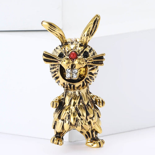Product image 2 showing the textured rabbit brooch with red eyes in silver or gold.