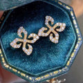 Four Leaf Clear Pave Stud Earrings Three Metal Tones view 3