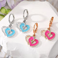 Gold and Silver Tone Double Heart Huggie Drop Earrings in Two Colors view 1