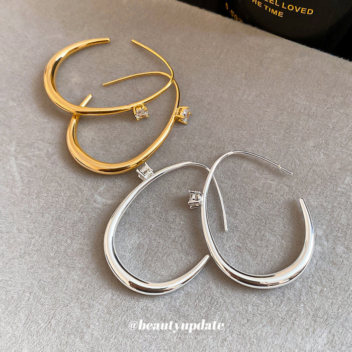 Open Oval Hoop Earrings with Crystal Accent in Silver Tone