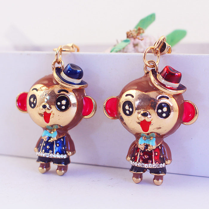 Hat Monkey Metal Keychain With Lobster Clasp And Clear Stone Details
