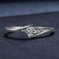 Round Solitaire Curved Split Ring In Three Metal Tones view 3