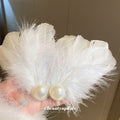 White Feather Hair Clip With Large Pearl Like Center Accent view 2