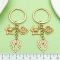 Heart Charm Keychains Featuring Cross Across 22 Pictured Variations view 2