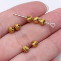Grooved Pumpkin Round Beads in Silver and Gold Tones view 3