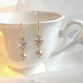 Gold Tone Clear Stone Snowflake And Pink Pearl Hook Earrings view 3