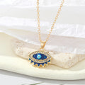 Gold and Silver Tone Crystal Blue Evil Eye Pendant Necklaces view 1