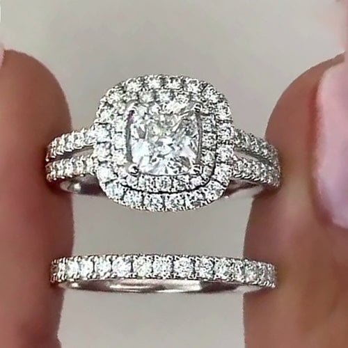 Front view of cushion double halo ring with eternity band below