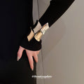 Sculptural Flared Wide Hinged Cuff In Gold Or Silver Tone Finishes view 3