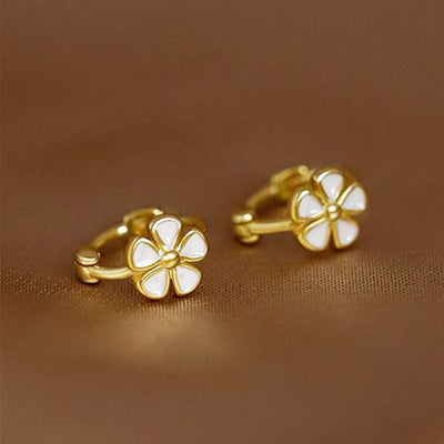 Pair of gold white enamel flower mini huggie hoop earrings