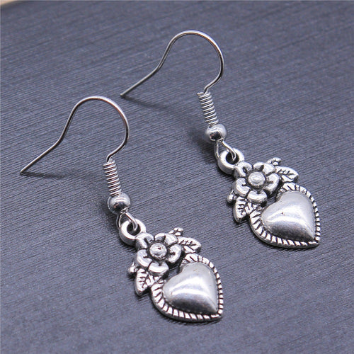 Flower And Heart Dangle Earrings in Two Antique Finishes shown in image 2 with flower-topped heart drops on fishhooks
