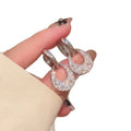 Silver Tone Crystal Teardrop Huggie Earrings With Open Centers view 5