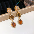 Triple Crystal Drop Ear Clips in Gold and Silver Tones view 7