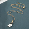 Gold Tone White Astronaut Celestial Pendant Necklaces view 2
