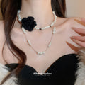 Layered Pearl Necklace with Black Fabric Flower Accent view 3