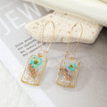Gold Tone Rectangular Clear Resin Pressed Flower Long Wire Earrings view 3