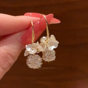 Gold-Tone Hook Earrings with a White Flower, Faux Pearl, and Crystal Drop