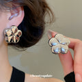 Polished Five Petal Flower Stud Earrings in Gold and Silver view 3