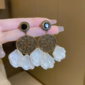 White Floral Shell and Pearl Drop Earring Collection view 10