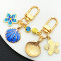 Three Color Blue Pink Shell Flower Metal Clasp Keychain Set view 4