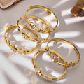Crystal Motif Bangle Collection in Nine Gold and Silver Styles view 1
