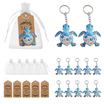 Blue sea turtle keychains displayed with white organza bags and kraft thank-you tags.