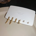 Minimal Gold Tone Stud And Huggie Earring Set Jewelry Design view 6
