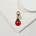 Gold Tone Daisy and Ladybug Lobster-Clasp Charms in Five Designs view 5