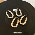 Silver Tone Sculpted Oval Hoop Earrings Matching Jewelry Pair view 4