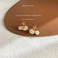 Gold Tone Starfish Shell Pearl And Clear Stone Stud Earrings view 3
