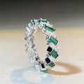 Green And Clear Baguette Woven Eternity Band In Silver Tone view 2