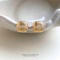 Gold-Tone Textured Square Stud Earrings Baguette Band view 1