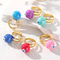 Gold Tone Swirled Resin Evil Eye Adjustable Rings in Nine Colors view 1
