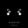 Gold Tone Twisted Loop And White Pearl Drop Stud Earrings For Women view 3