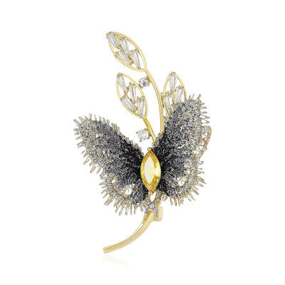 Black embroidered butterfly with gold frame front