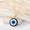Round Blue Evil Eye Pendant Necklaces in Gold and Silver Tone Sizes view 11