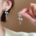 Silver Tone Floral Crystal Drop Stud Earrings With Decorative Metal Accents view 3