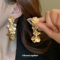 Sculpted Metal Flower Drop Earrings In Gold And Silver Tones view 3