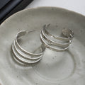 Hammered Triple Band Gold and Silver Open C Hoop Earrings view 7